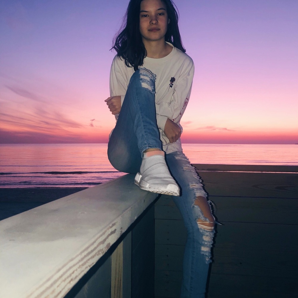 Venus in the half shell painted ripped jeans